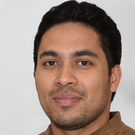 Neutral latino young-adult male with short  black hair and brown eyes