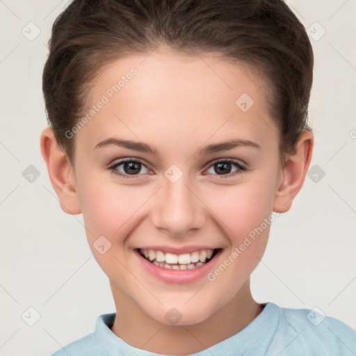 Joyful white child female with short  brown hair and brown eyes