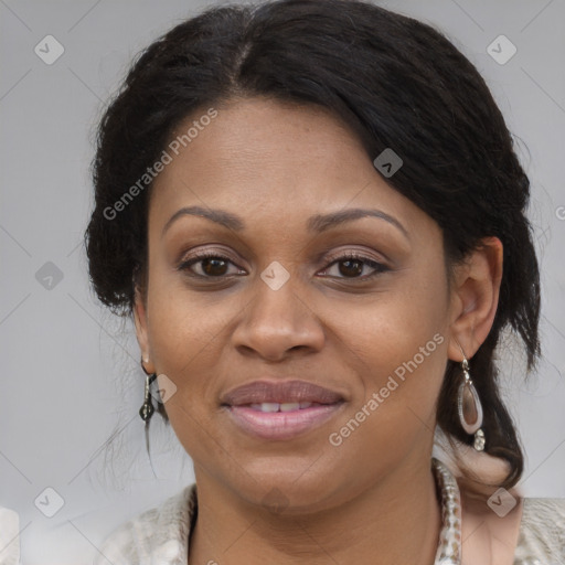 Joyful black adult female with medium  brown hair and brown eyes