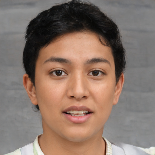 Joyful asian young-adult female with short  brown hair and brown eyes