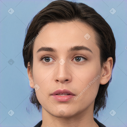 Neutral white young-adult female with medium  brown hair and brown eyes