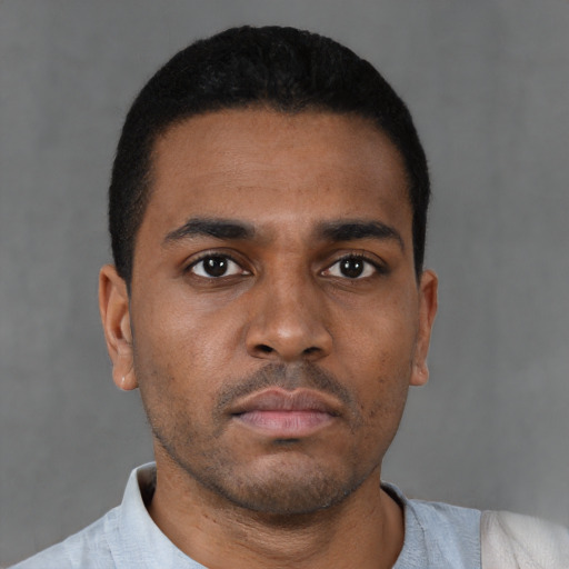 Neutral black young-adult male with short  brown hair and brown eyes