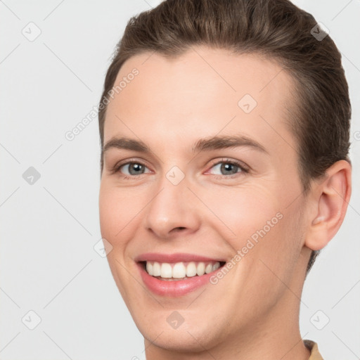 Joyful white young-adult female with short  brown hair and brown eyes