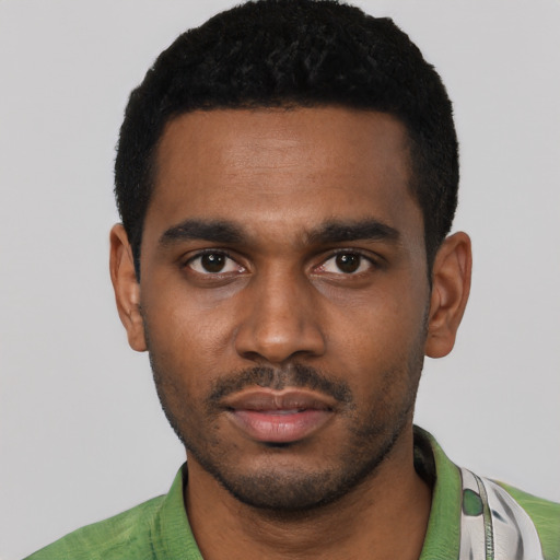 Neutral black young-adult male with short  black hair and brown eyes