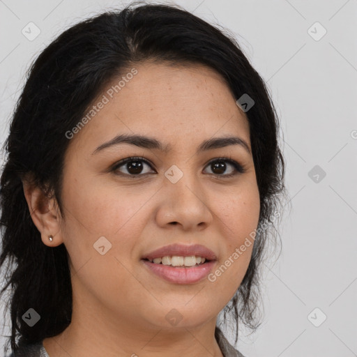 Joyful latino young-adult female with long  brown hair and brown eyes