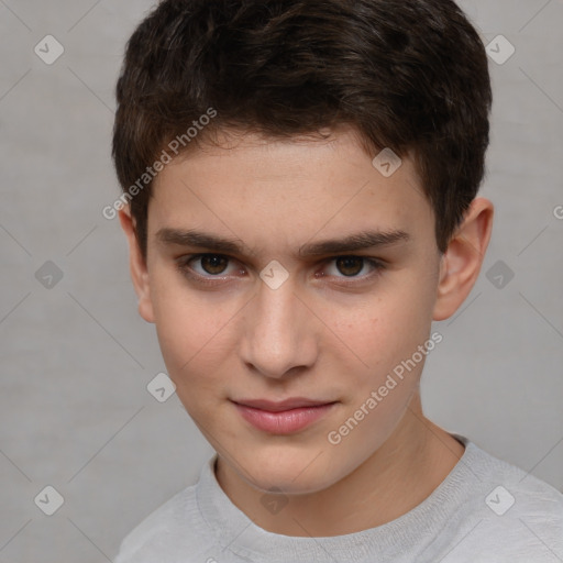 Joyful white child male with short  brown hair and brown eyes