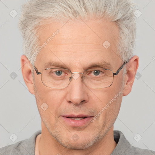 Neutral white middle-aged male with short  gray hair and brown eyes