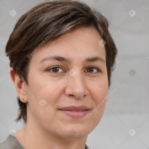 Joyful white adult female with medium  brown hair and grey eyes