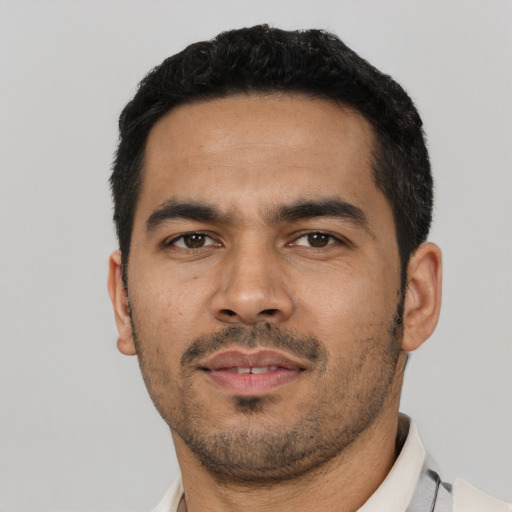 Neutral latino adult male with short  black hair and brown eyes
