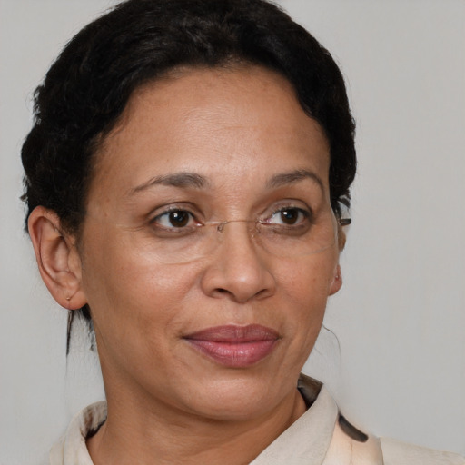 Joyful white adult female with short  brown hair and brown eyes