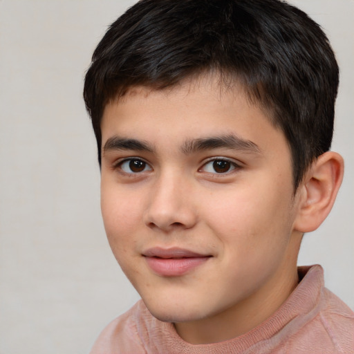 Joyful white child male with short  brown hair and brown eyes