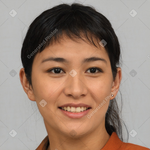 Joyful asian young-adult female with short  brown hair and brown eyes