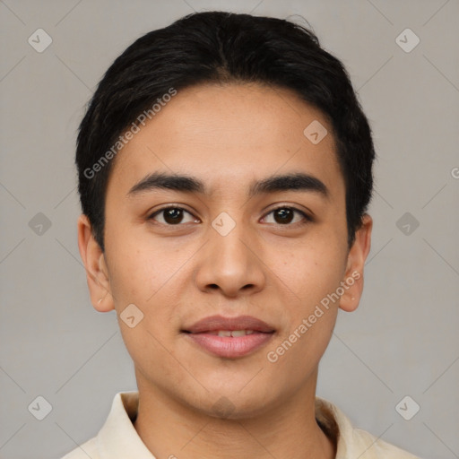 Joyful asian young-adult male with short  black hair and brown eyes