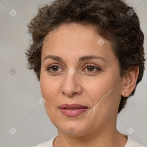 Joyful white adult female with short  brown hair and brown eyes