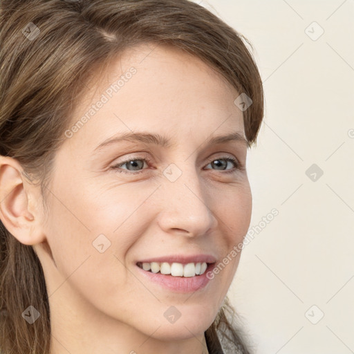 Joyful white young-adult female with long  brown hair and grey eyes