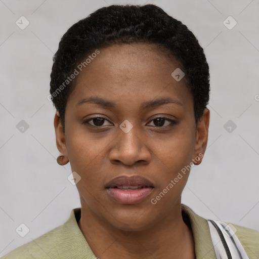 Joyful black young-adult female with short  black hair and brown eyes