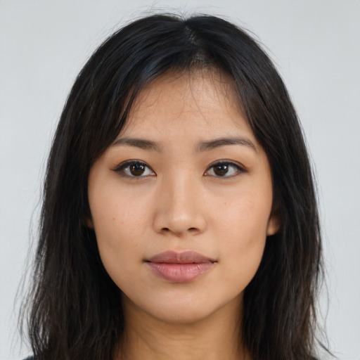 Neutral asian young-adult female with long  brown hair and brown eyes