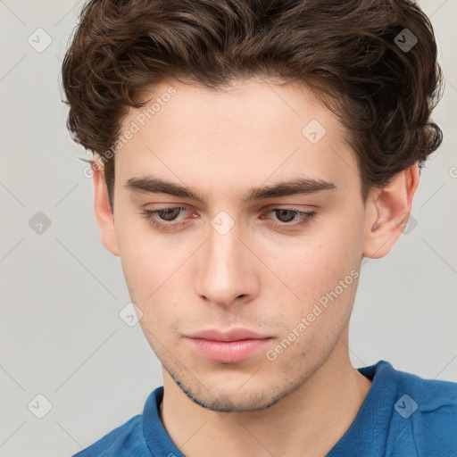 Neutral white young-adult male with short  brown hair and grey eyes