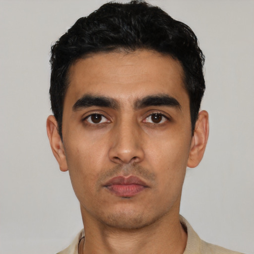 Neutral latino young-adult male with short  black hair and brown eyes