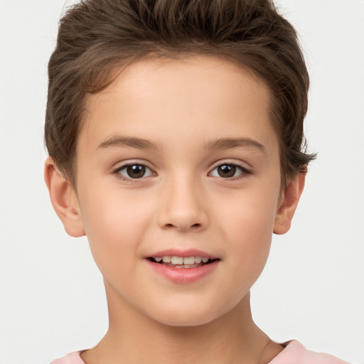 Joyful white child female with short  brown hair and brown eyes