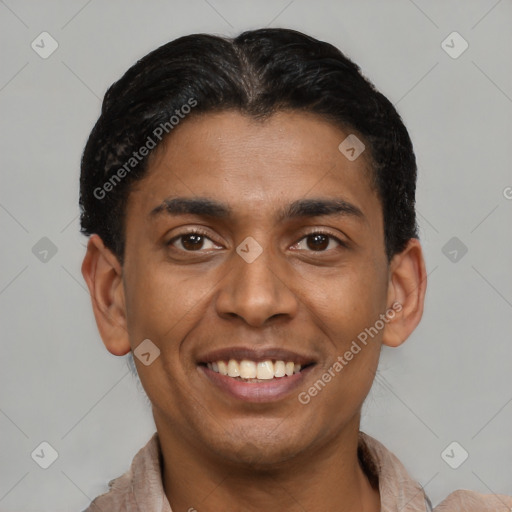 Joyful latino young-adult male with short  brown hair and brown eyes