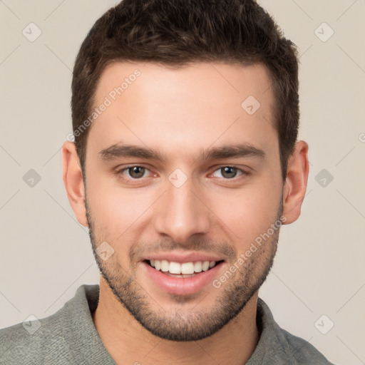 Joyful white young-adult male with short  brown hair and brown eyes