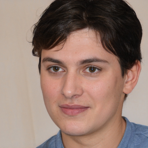 Joyful white young-adult male with medium  brown hair and brown eyes