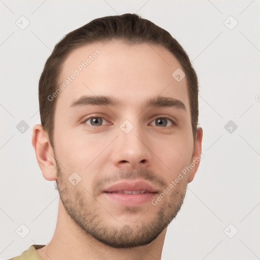 Neutral white young-adult male with short  brown hair and grey eyes