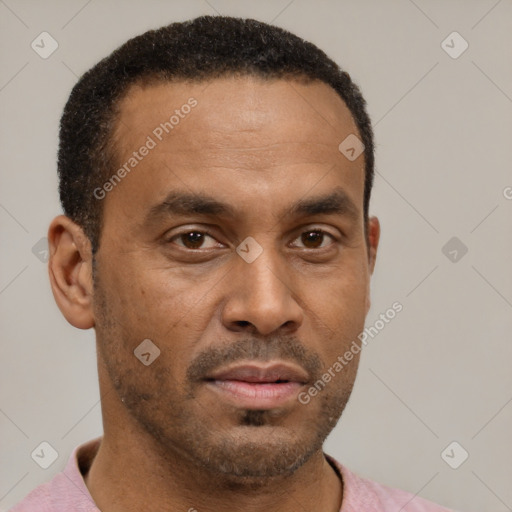 Neutral latino young-adult male with short  brown hair and brown eyes