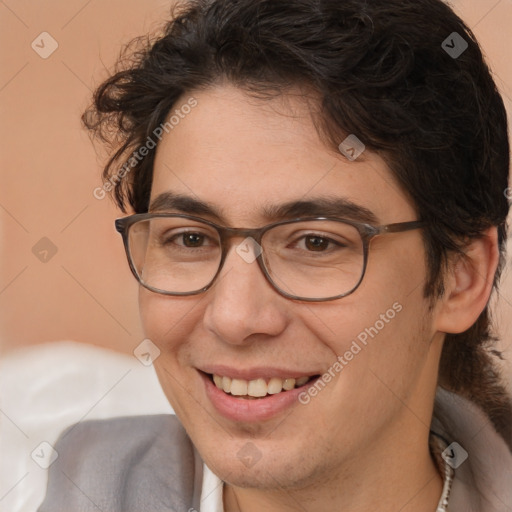 Joyful white adult male with medium  brown hair and brown eyes