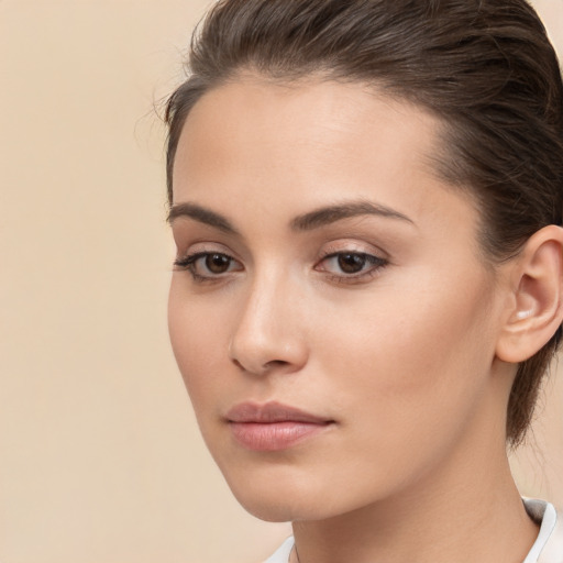 Neutral white young-adult female with medium  brown hair and brown eyes