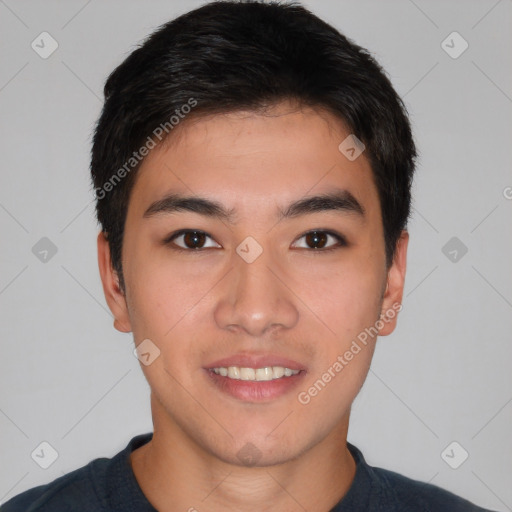 Joyful asian young-adult male with short  brown hair and brown eyes