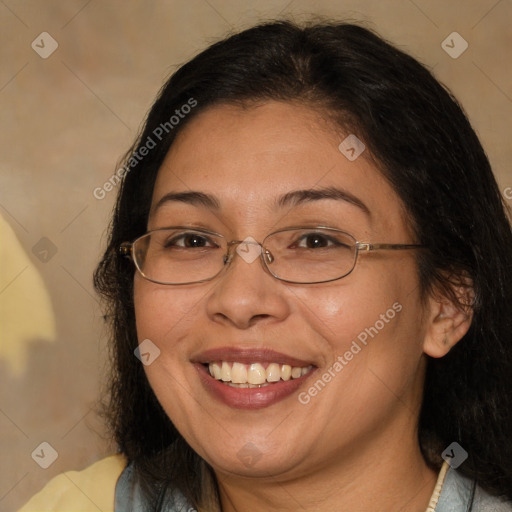 Joyful white adult female with medium  brown hair and brown eyes