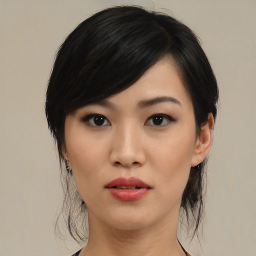 Neutral asian young-adult female with medium  black hair and brown eyes