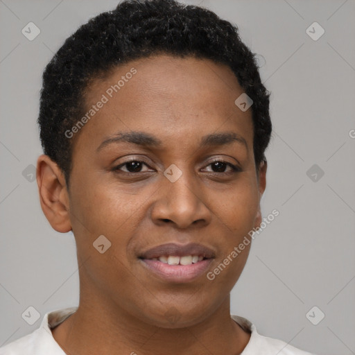 Joyful black young-adult female with short  brown hair and brown eyes