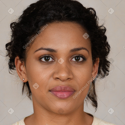 Joyful black young-adult female with medium  brown hair and brown eyes