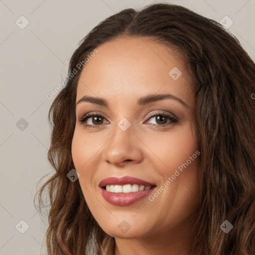 Joyful white young-adult female with long  brown hair and brown eyes