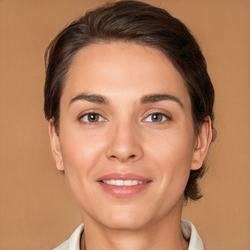 Joyful white young-adult female with medium  brown hair and brown eyes