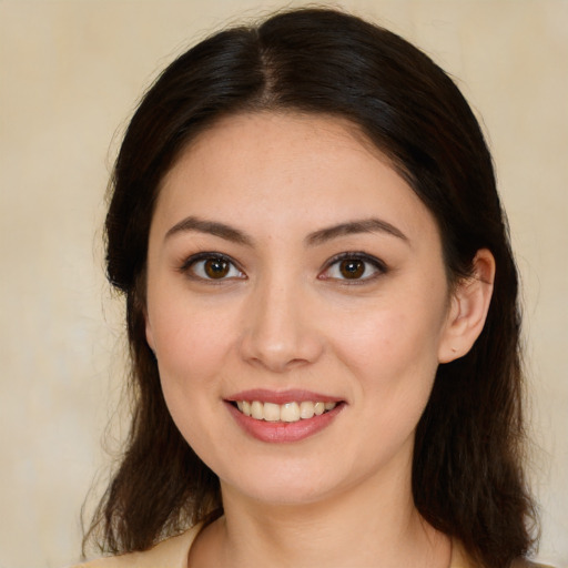 Joyful white young-adult female with medium  brown hair and brown eyes