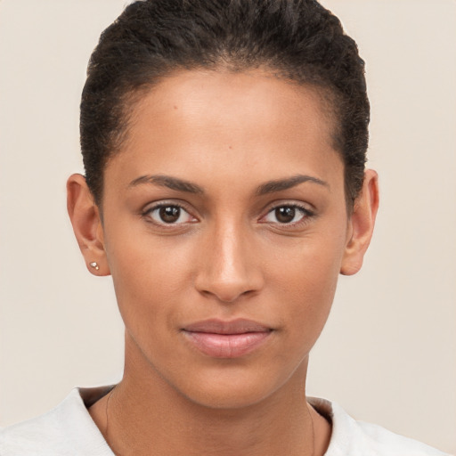 Joyful white young-adult female with short  brown hair and brown eyes