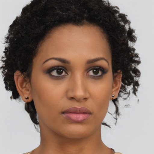 Neutral latino young-adult female with medium  brown hair and brown eyes