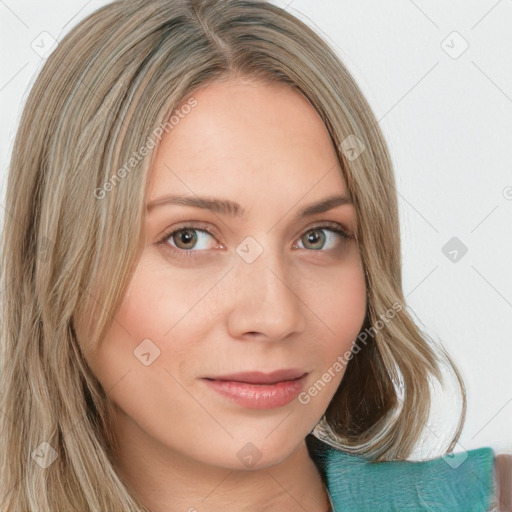 Joyful white young-adult female with long  brown hair and green eyes