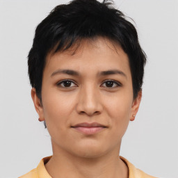 Joyful asian young-adult female with short  black hair and brown eyes