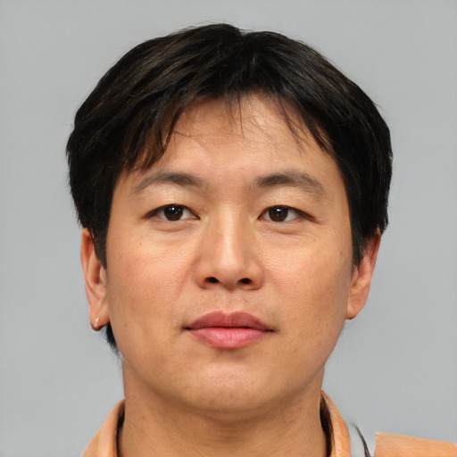 Neutral asian young-adult male with short  brown hair and brown eyes