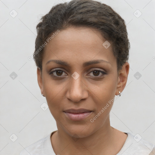 Joyful latino young-adult female with short  brown hair and brown eyes