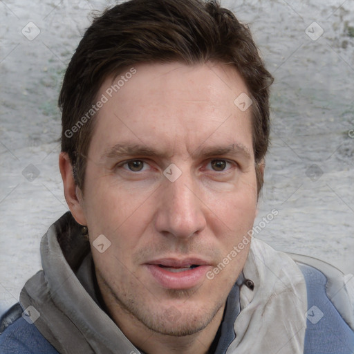 Joyful white adult male with short  brown hair and grey eyes