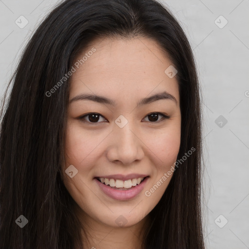 Joyful asian young-adult female with long  brown hair and brown eyes