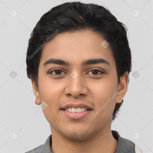 Joyful latino young-adult male with short  black hair and brown eyes