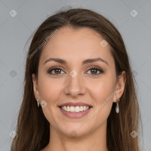 Joyful white young-adult female with long  brown hair and grey eyes