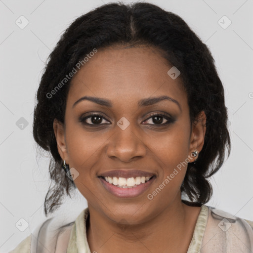 Joyful black young-adult female with long  brown hair and brown eyes